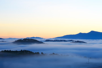Misty mountain layer at dawn