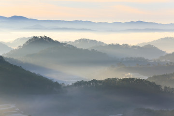 Misty mountain layer at dawn