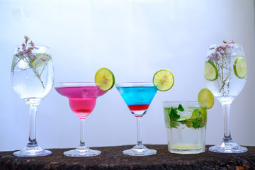 Refreshing cocktail selection on white background
