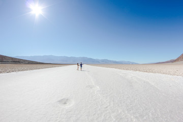 Salt flats at Badwater Basin in Death valley middle of a very hot day.