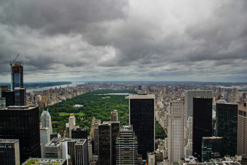 View of New York skyline and skyscrapers with Central Park in the background, with very heavy stormy clouds