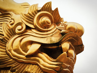 Golden dragon statue face