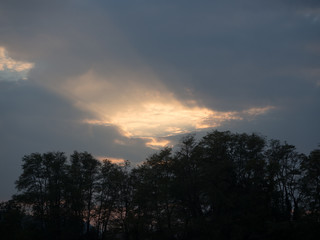 Fototapeta na wymiar Sun and clouds before rain
