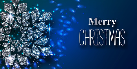 Blue Merry Christmas greeting card with silver shiny snowflake.