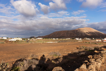 Landscape with cloudy sky in the region of La Oliva. Fuerteventura, Canary Islands, Spain