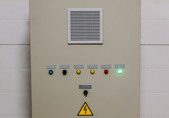 Closed ventilation system control cubicle on the wall of the ventilation room