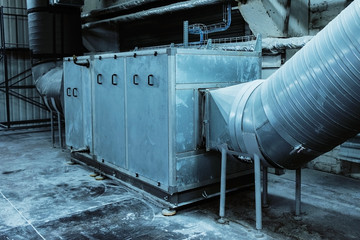 Side view of the huge industrial air handling unit in the ventilation plant room