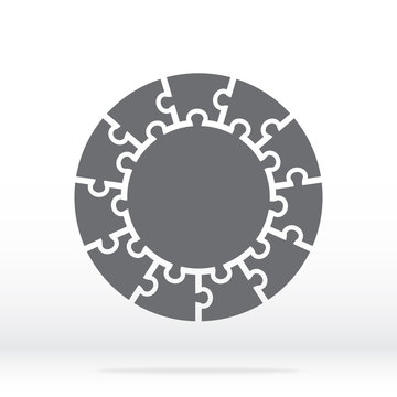 Simple icon circle puzzle in gray. Simple icon circle puzzle of the eleven elements and center on gray background. Flat design. Vector illustration EPS10.