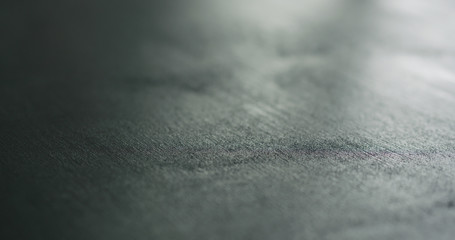 closeup of painted black plywood