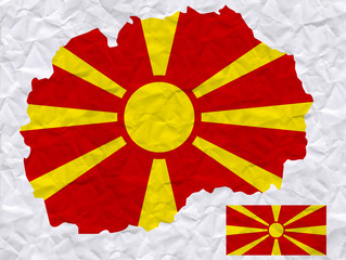 old crumpled paper with watercolor painting of Macedonia flag and map