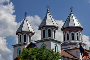 Fototapeta na wymiar Cupolas on an Orthodox church in Blăjel, Romania