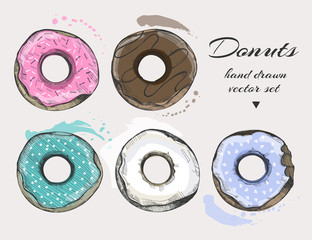 Hand drawn tasty donuts. Colored graphic vector set. All elements are isolated