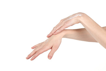 Elegant female hands smear hand cream. Skin care.
