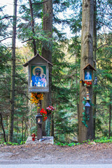 ZARABIE, POLAND - MARCH 15, 2015: Roadside chapels in Carpathian Mountains