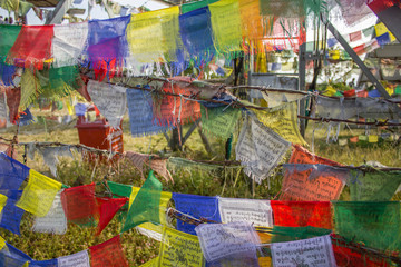 Pokhara/Nepal - 27.10.2018: Tibetan Buddhist colored prayer flags on barbed wire. Tibet will be free.
