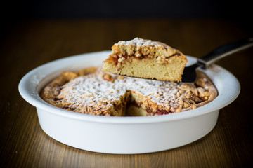 sweet cake with jam in ceramic form