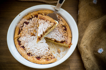sweet cake with jam in ceramic form