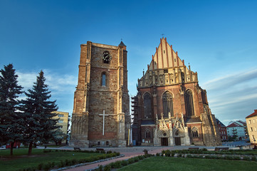 facade of a medieval Roman Catholic church in the Gothic style in Nysa..