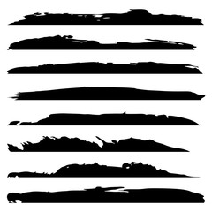 Vector collection of artistic grungy black paint hand made creative brush stroke set isolated on white background. A group of abstract grunge sketches for design education or graphic art decoration