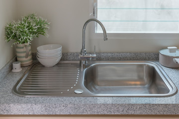 sink with faucet in kitchen room