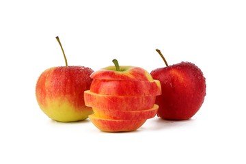 Sliced  ripe apple over white background