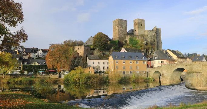 Panorama of Runkel Castle and old stone bridge across the Lahn river in Runkel, Hesse, Germany
