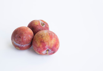Plum isolated in white background