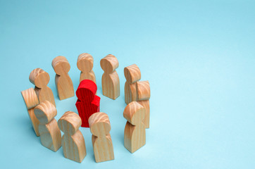 A crowd of workers stand in a circle and listen to their mentor, leader or CEO.The concept of leadership in a business team. Teamwork and business strategy development. Increase efficiency in the team