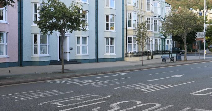 Aberystwyth Wales apartments city center fast. Ancient market town, administrative center, community, and holiday resort in Ceredigion, Wales. Tourist destination for beach, historic train, castles.