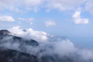 The overlooking from the top of the mountain / 山と雲と。山頂から眺めて。