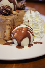 Toasted bread with chocolate sauce and vanilla ice cream