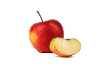 Red ripe apple with fresh sliced apple piece isolated on white