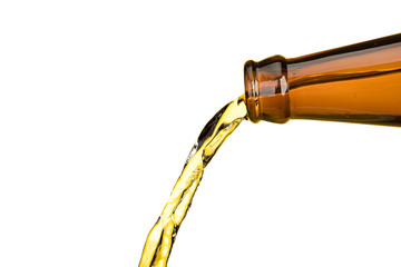 Bottle beer pouring isolated on white background with copy space object food and drink design