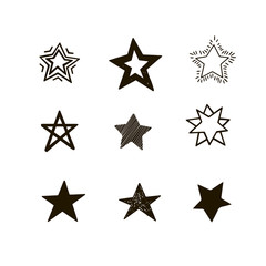 Set of black hand drawn vector stars in doodle style on white background. Could be used as pattern element