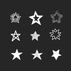 Set of white hand drawn vector stars in doodle style on black background. Could be used as pattern element