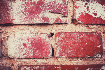 Weathered texture of stained old red brick wall background, grunge rusty blocks of stone-work technology, colorful horizontal architecture
