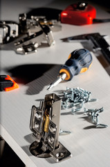 Furniture assembly. Work tool and components.