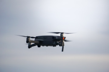 Fototapeta na wymiar New gen drone flying aerial shooting equipment gadget