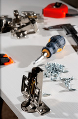 Furniture assembly. Work tool and components.