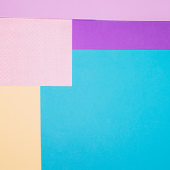 Texture background of fashion blue, yellow and purple papers in memphis geometry style. Flat lay, Top view. 80s or 90s concept. Space for text