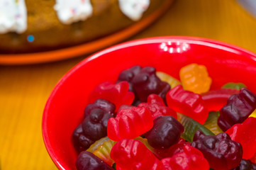 translucent multi-colored jelly sweeties in red bowl
