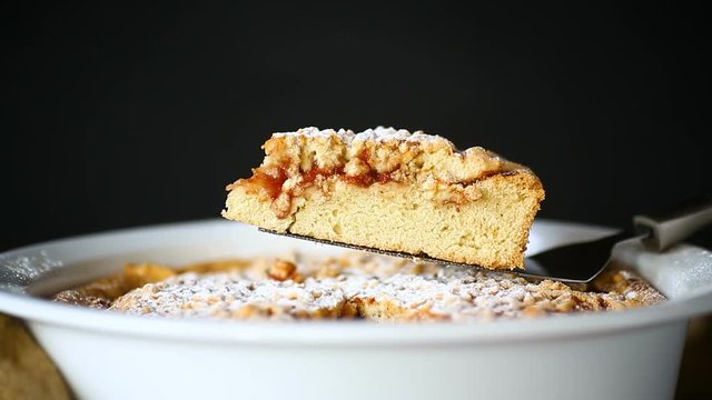 sweet cake with jam in ceramic form