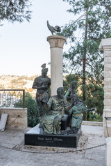 Statue describing the actions of St. Peter in the courtyard of Church of Saint Peter in Gallicantu...