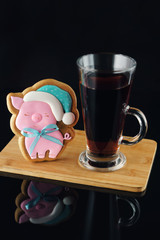 New Year's gingerbread in the form of a pig decorated with icing