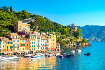 Fototapeta na wymiar Beautiful sea coast with colorful houses in Portofino, Italy. Summer landscape