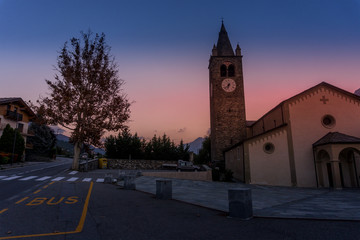 Fototapeta na wymiar church with bell tower at sunset
