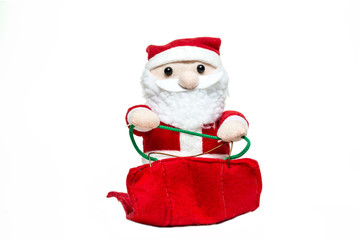 Doll Santa Claus on the sleigh on white background. merry christmas. Front