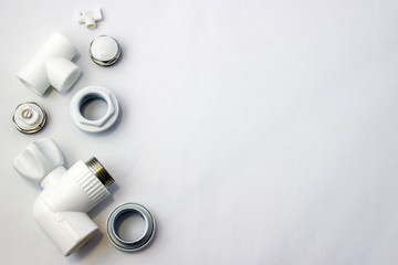 valve, drain valve, valve, adapter top view. spare parts for the installation of radiators. The background is gray.