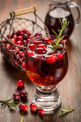Mulled wine or hot punch with cranberries for Xmas