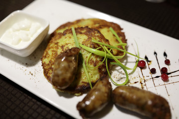 Sausages and potato pancakes